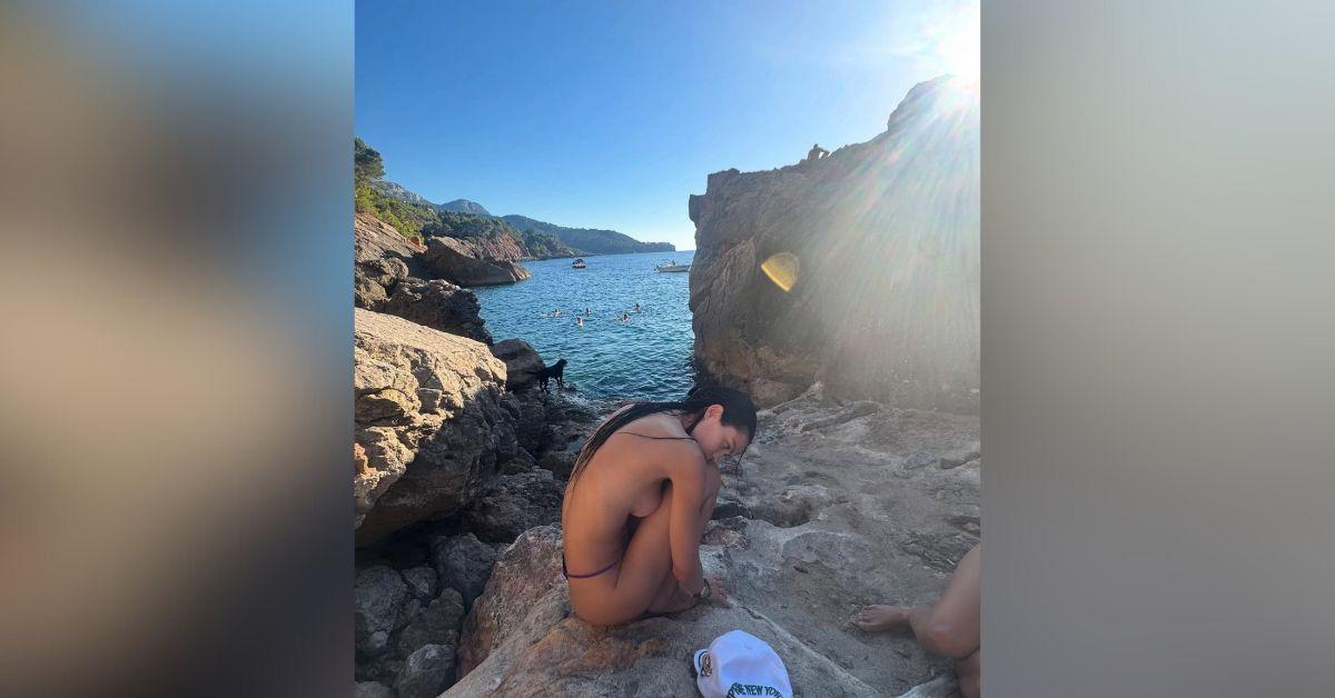 image of The model enjoyed her day at the beach with a group of friends.