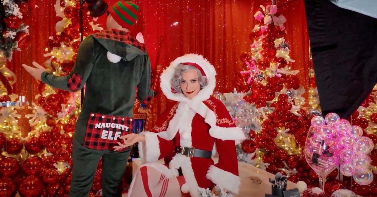 Image of Jenny McCarthy and Donnie Wahlberg channeled Mrs. Claus and an elf.