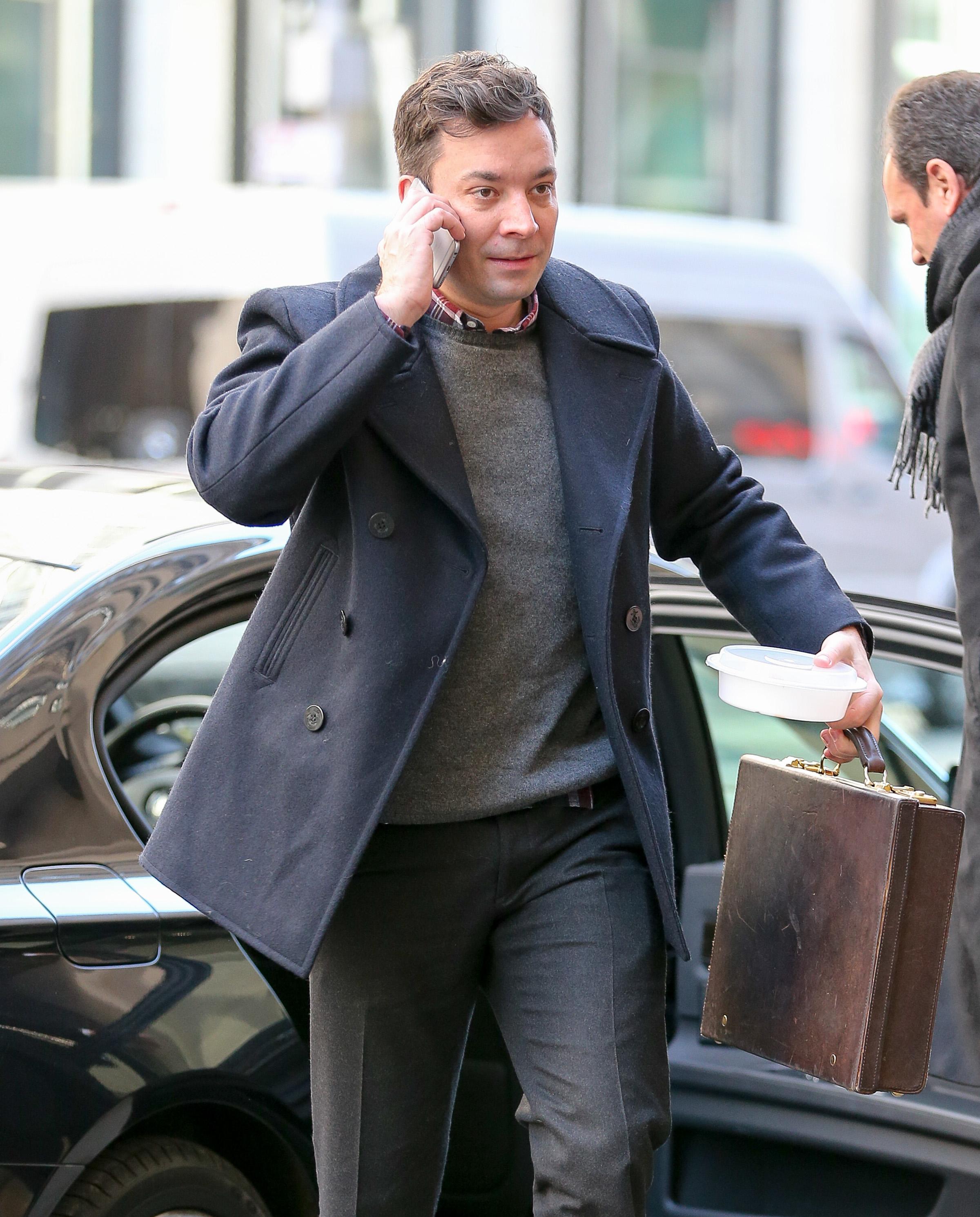 Jimmy Fallon chats on his cellphone on his way back to work at the NBC Studios in New York City, NY