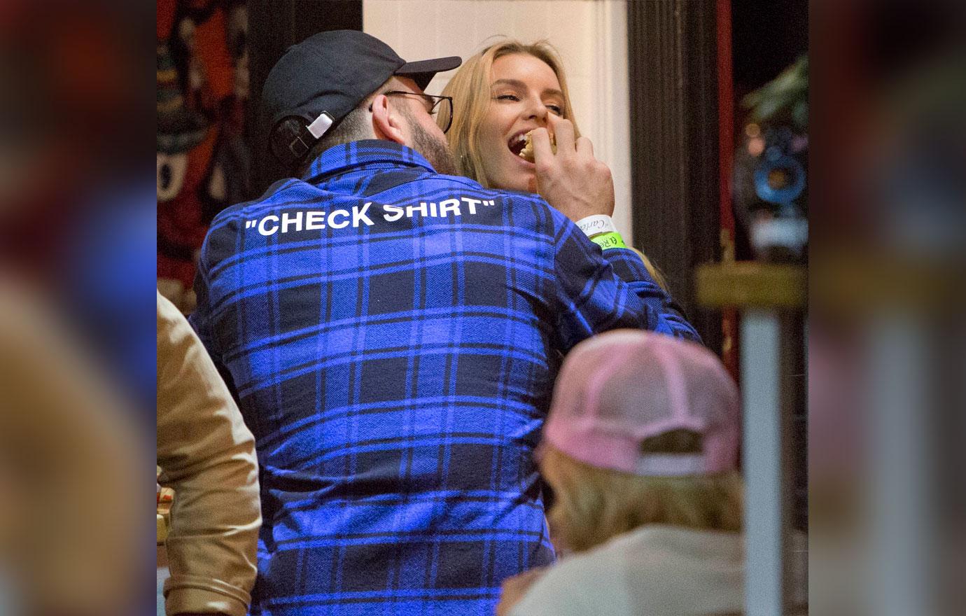 Alex Pall feeds his new girlfriend a burger before they go and see Singer Harry Hudson perform at the El Rey Theater in Los Angeles, CA