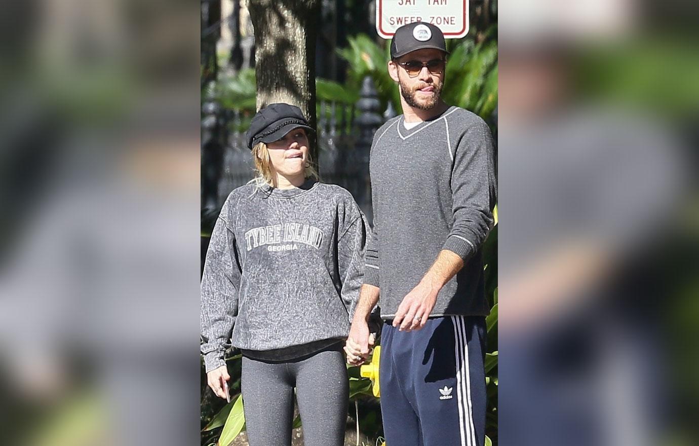 *EXCLUSIVE* Miley Cyrus and Liam Hemsworth wear wedding bands to the former &#8216;The Last Song&#8217; set!