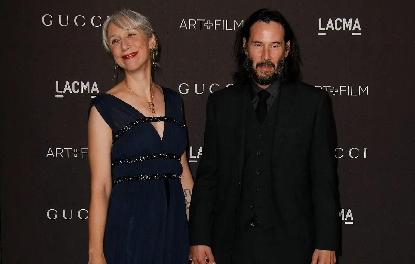 keanu reeves girlfriend alexandra grant hold hands photos