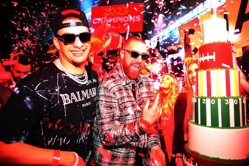 patrick mahomes and travis kelce pose with custom cake during celebration at xs nightclub inside wynn las vegas on feb photo credit danny mahoney