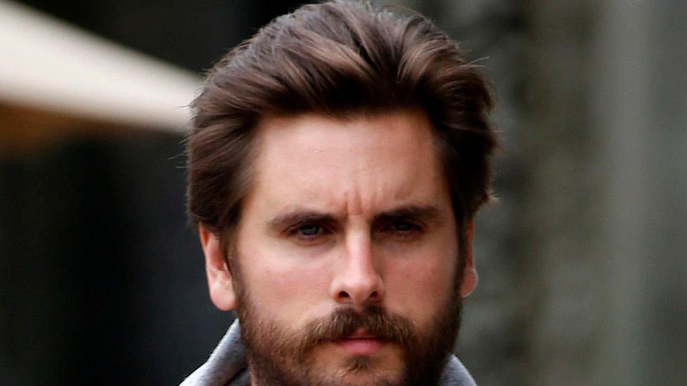 Scott Disick looks stressed as he avoids questions while leaving a restaurant in Calabasas, CA.