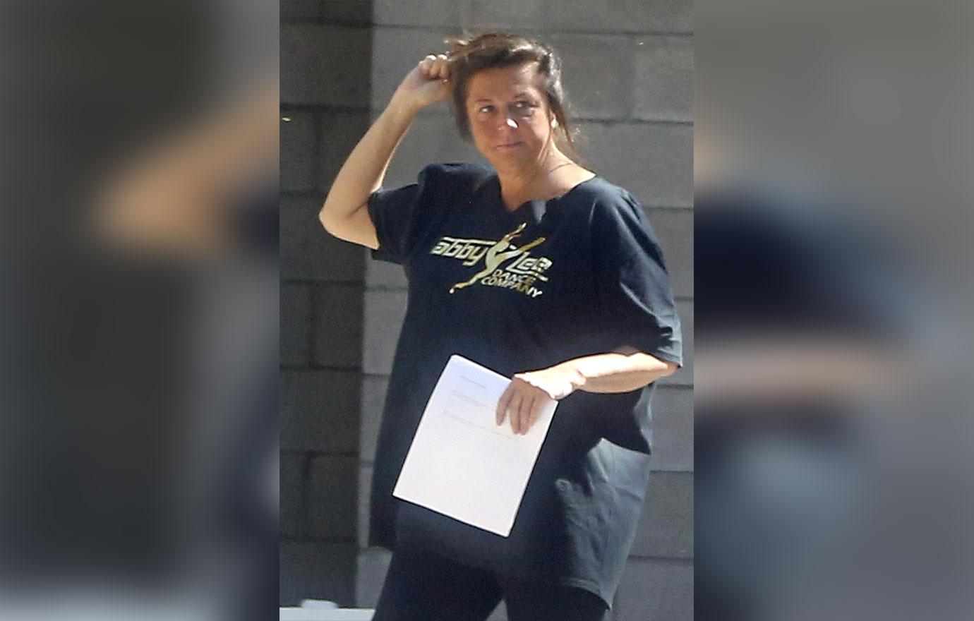 Abby Lee Miller Sports Dance Moms Shirt While Drinking Soda at Halfway House