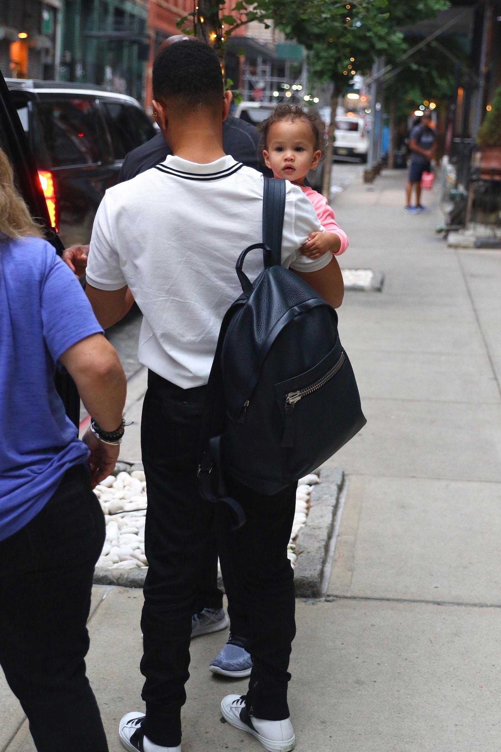 Chrissy Teigen &amp; John Legend check out of their hotel in New York