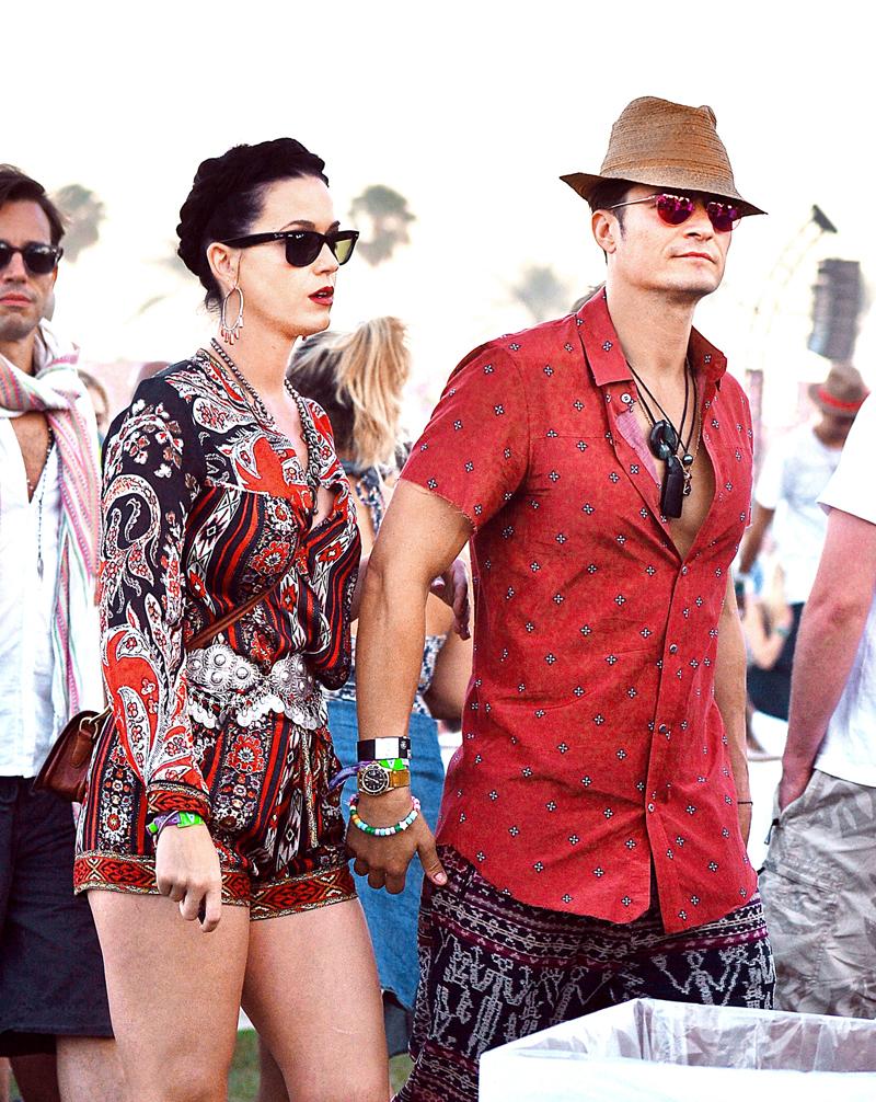 EXCLUSIVE: Orlando Bloom and Katy Perry spotted walk arm in arm at Coachella in Indio, CA.