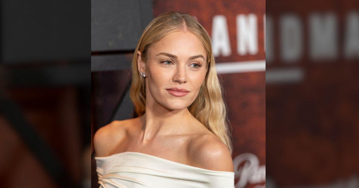Image of The actress stepped out in all-white with a quilted Chanel bag and layered gold jewelry.