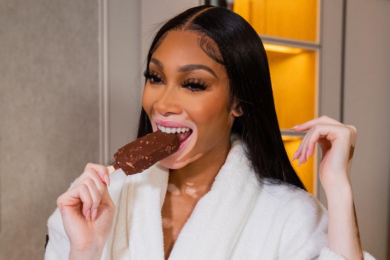 winnie harlow eating magnum ice cream as she readies for the british fashion awardscredit getty