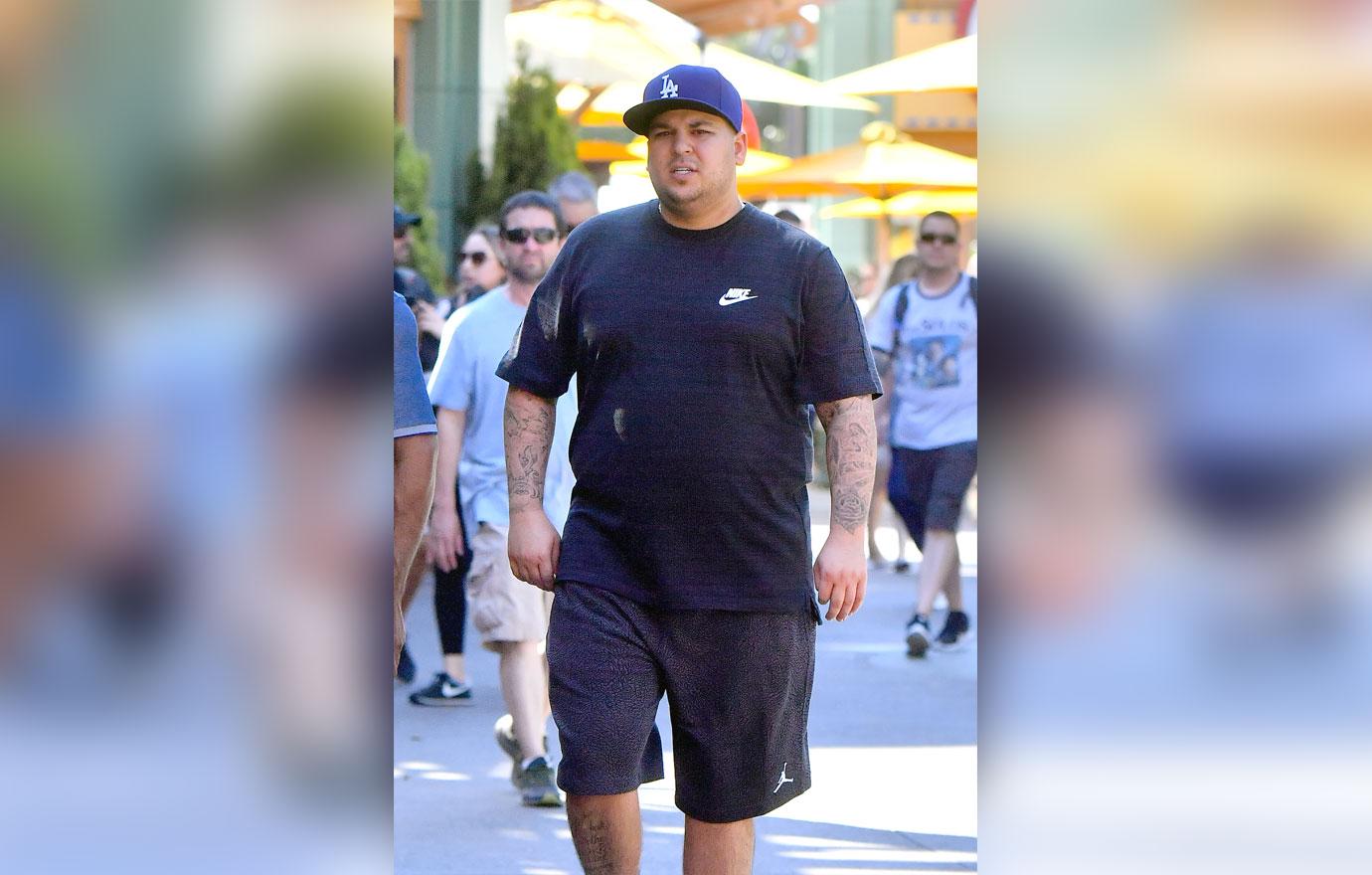 EXCLUSIVE: Rob Kardashian spotted picking up snacks at Wetzels Pretzels in Disneyland