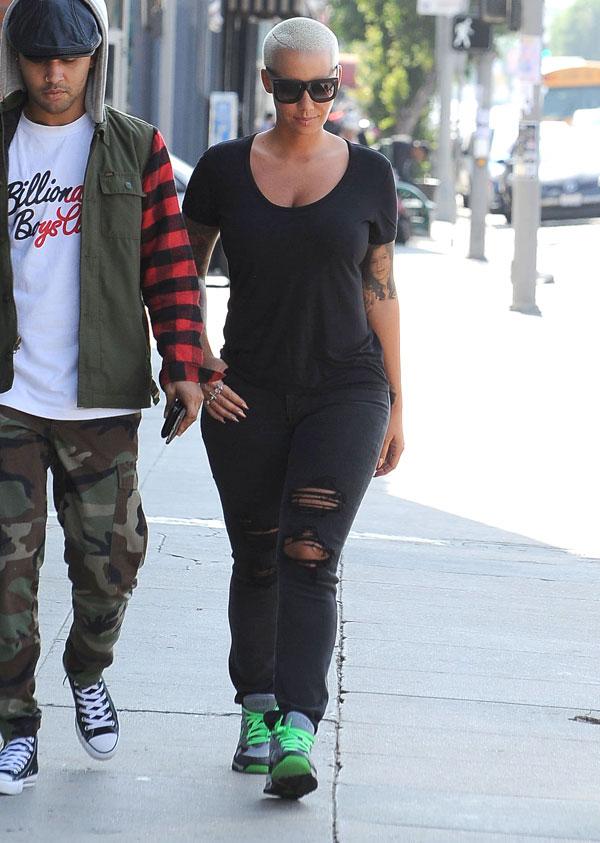Amber rose lip piercing4