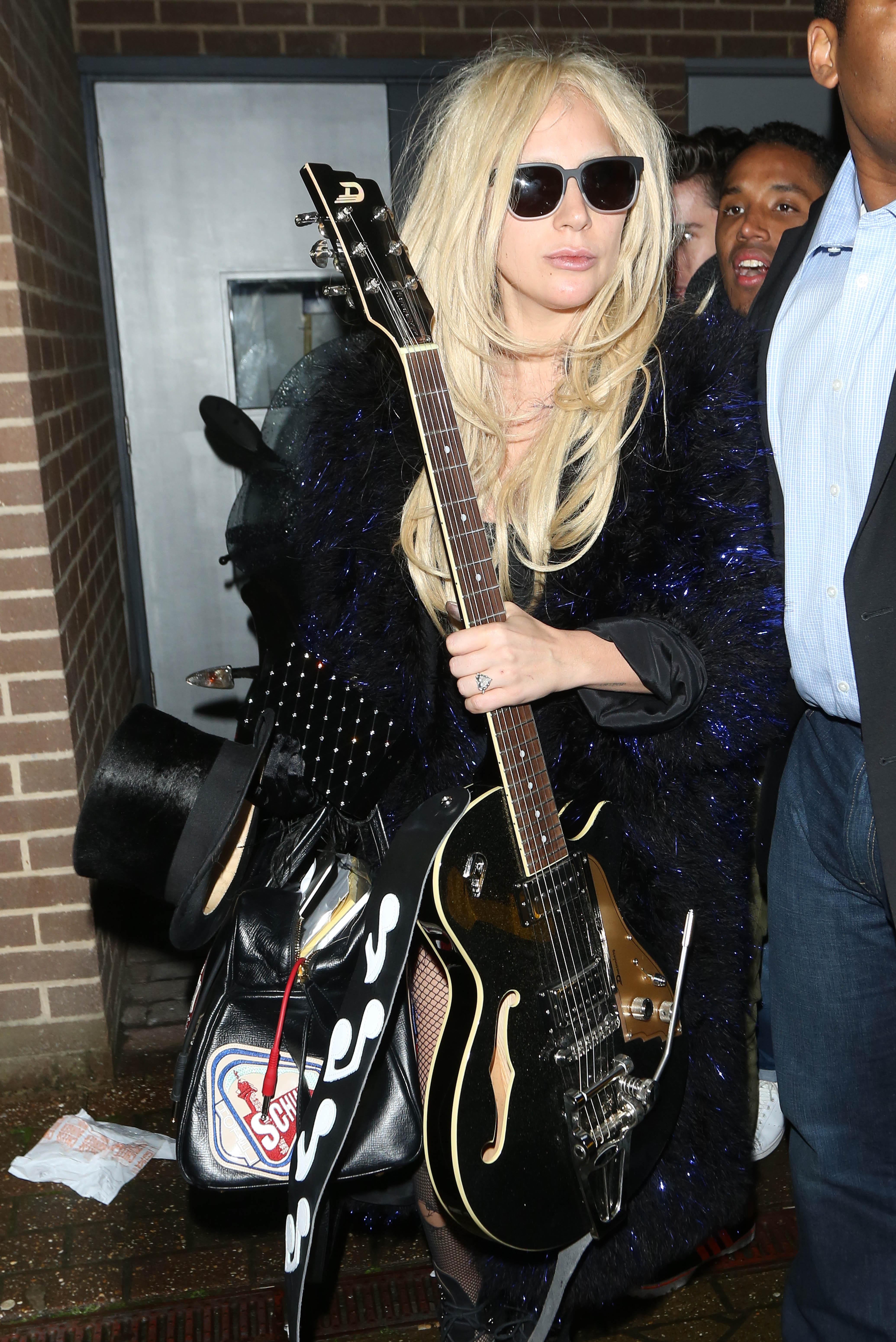 Lady Gaga leaves recording studio in London at 6.30am with Mark Ronson