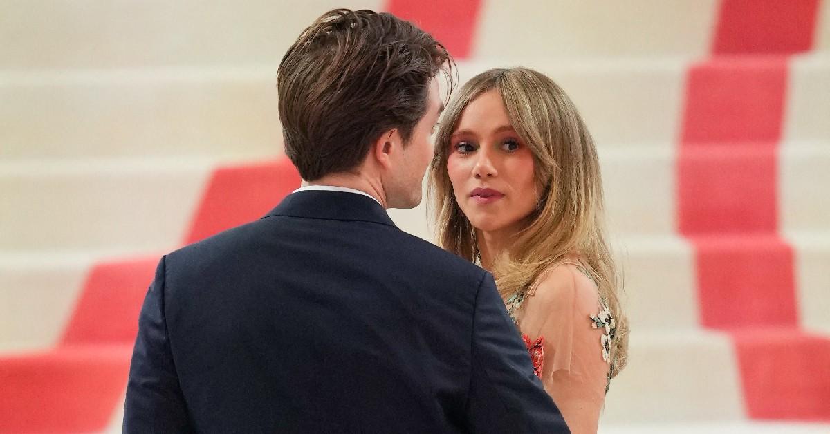 Suki Waterhouse Barely Avoids a Nip Slip & Run-In With Bradley Cooper