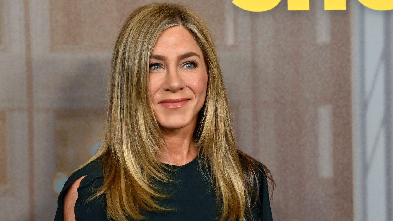 Image of Jennifer Aniston is reportedly ‘really happy’ with Jim Curtis as their romance continues to grow.