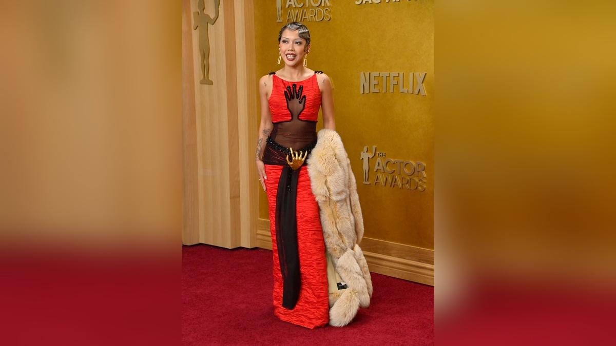 Image of Nava Rose Rabago's gown featured a gold hand on her crotch.