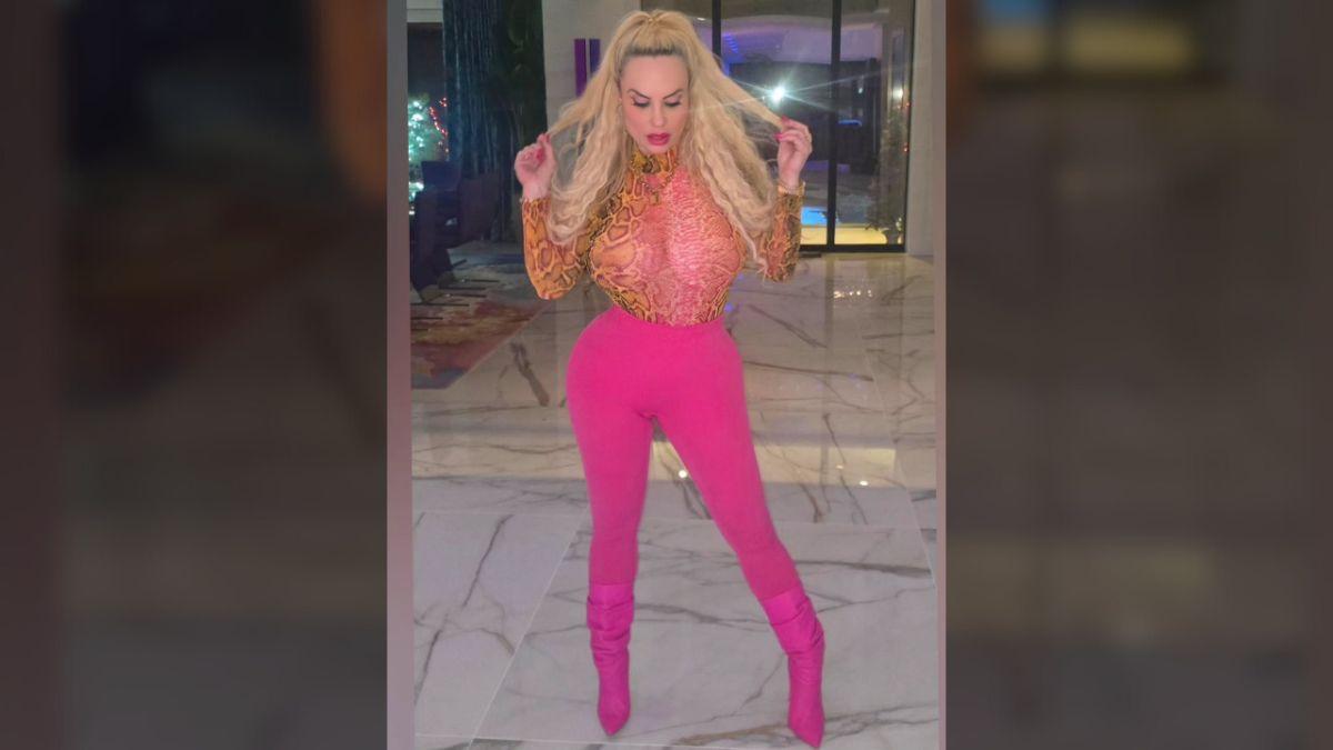 image of Coco Austin showed off her curves in a skin-tight pink outfit.