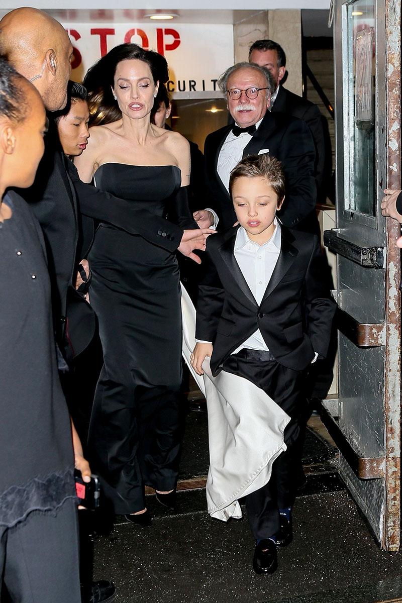 Angelina Jolie Stuns In A Form-Fitting Dress While Out With Her Children