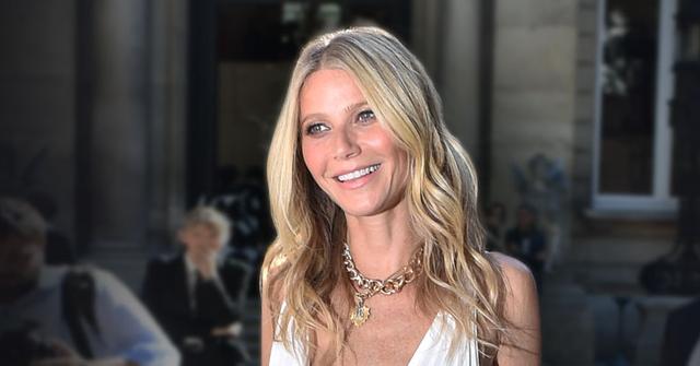 Gwyneth Paltrow Smiling Wearing White dress