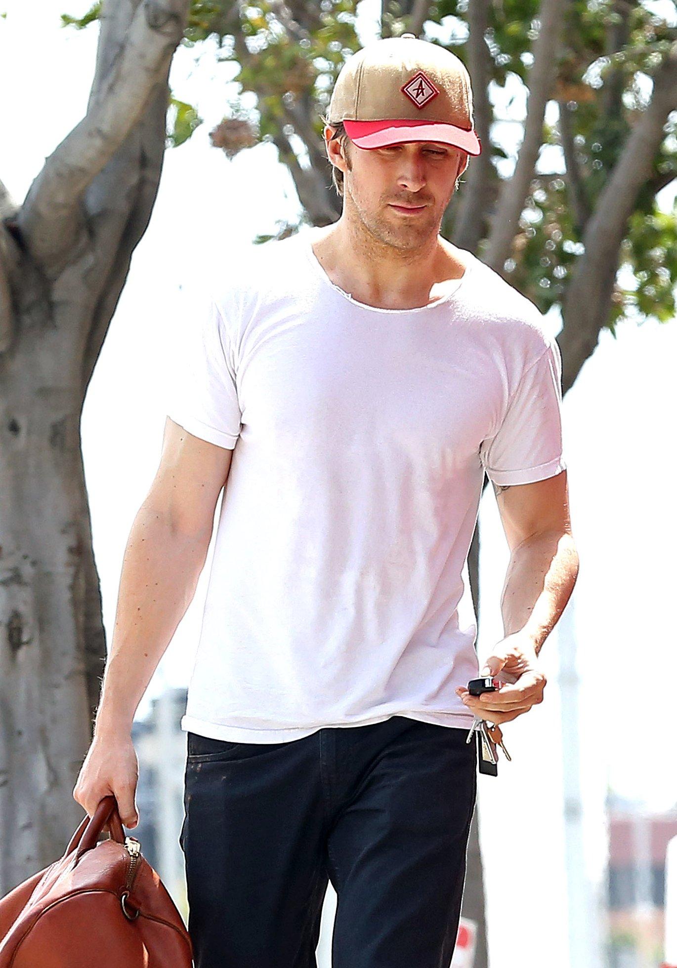 Ryan Gosling Carries His Leather Duffel As He Heads To Gym