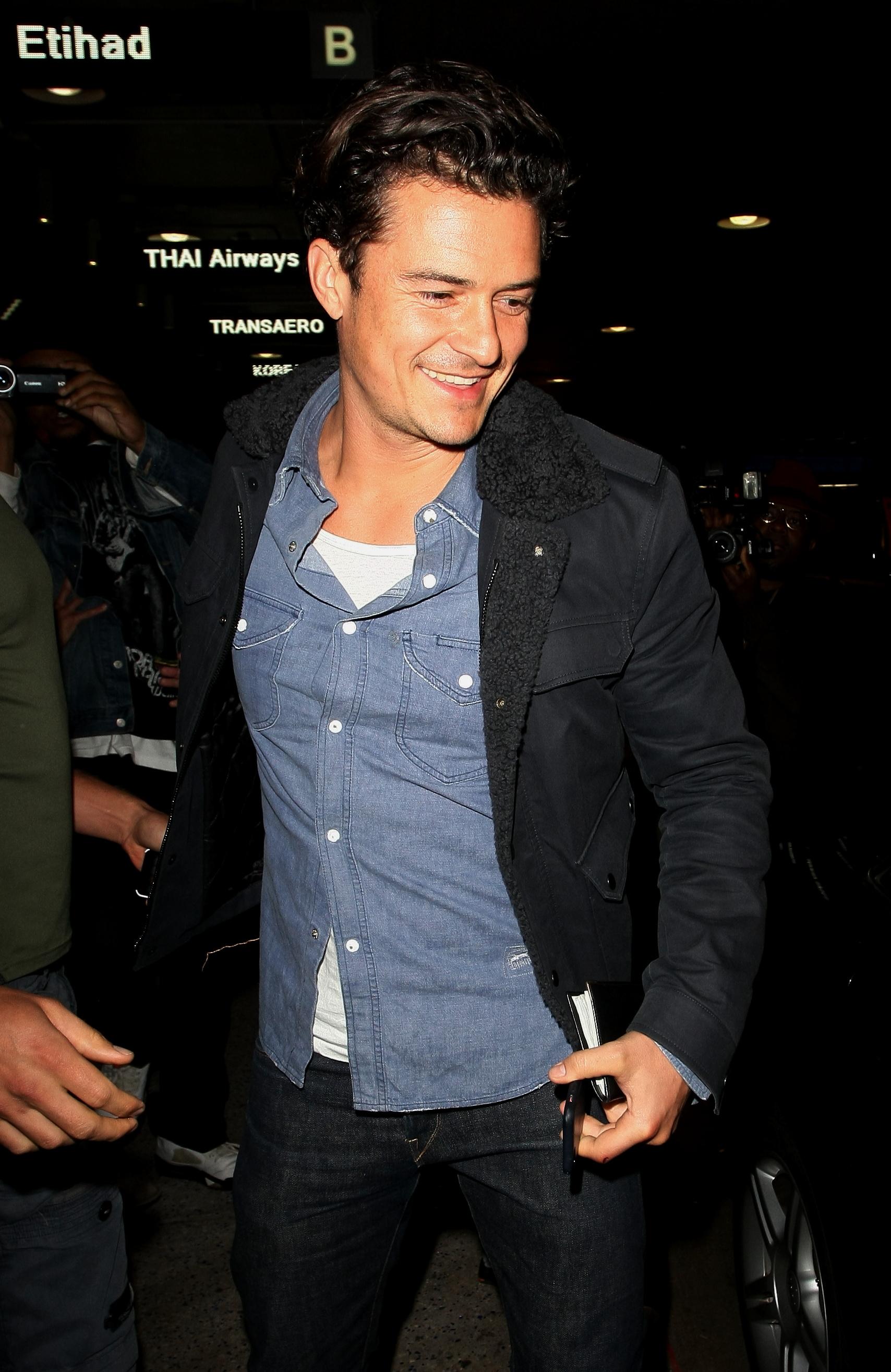 Actor Orlando Bloom arrives at LAX airport in Los Angeles, Ca