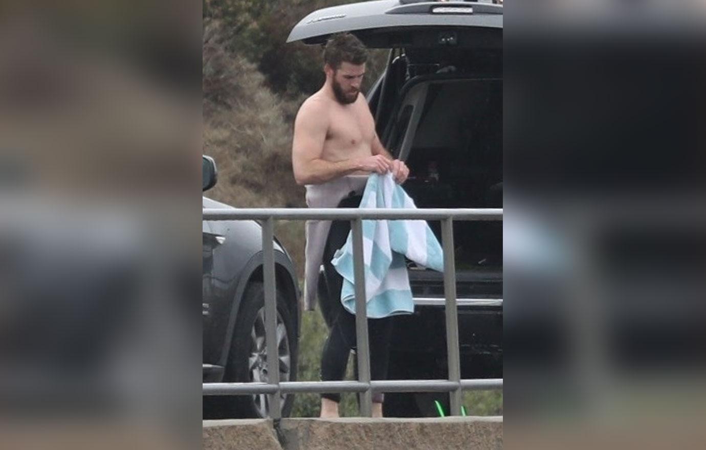 *EXCLUSIVE* Liam Hemsworth strips off after surfing in Malibu