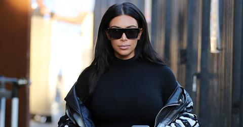 Kim Kardashian wears a painted biker jacket with her own face on it as she films Keeping up with the Kardashians.