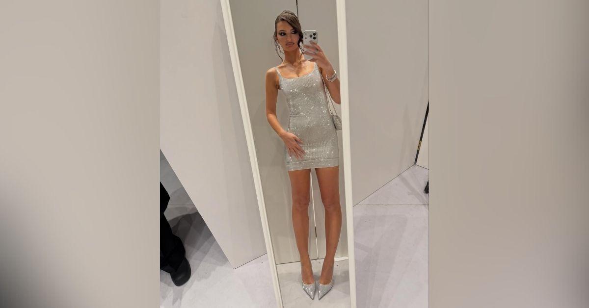 image of The mother-of-one walked the runway in a silver glitter mini dress.