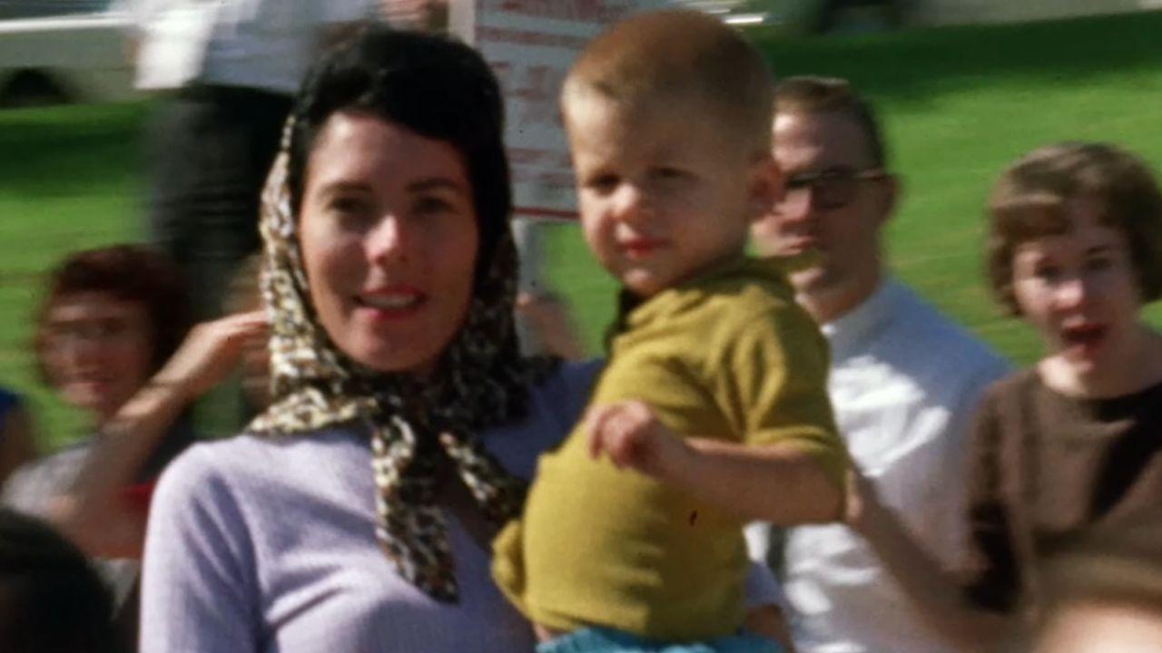 Image of Joan Jackson was photographed while watching President John F. Kennedy's motorcade in Dallas.