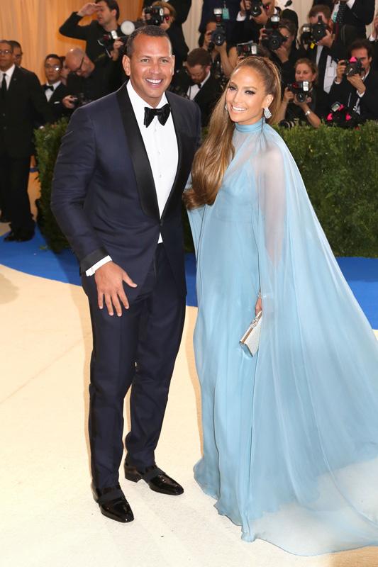 Alex Rodriguez and Jennifer Lopez pose together at the 2017 Met Gala