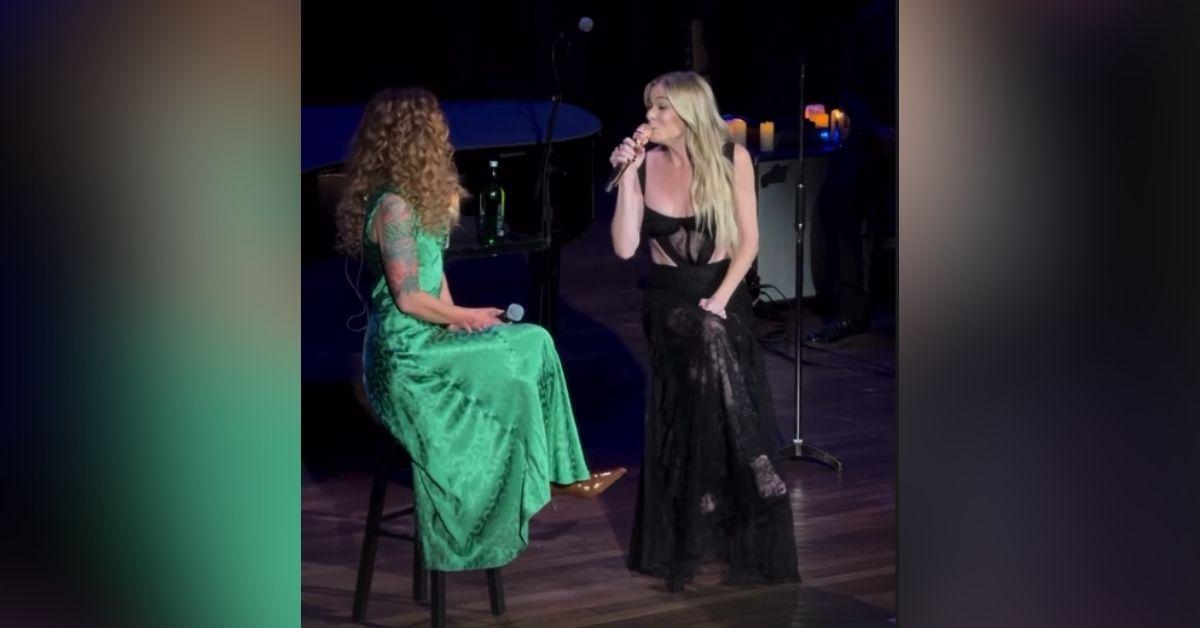 image of LeAnn Rimes stunned fans in a sheer black dress during her Nashville concert.