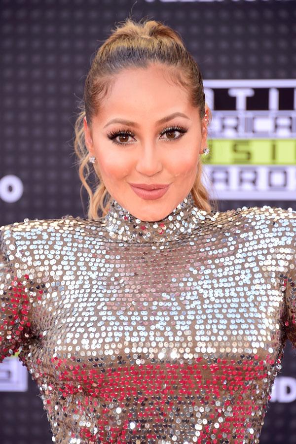 Adrienne bailon looks happy rob kardashian dating rumors