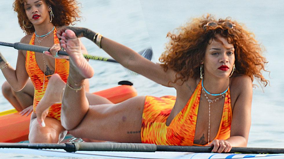 Rihanna swimsuit paddleboarding photos