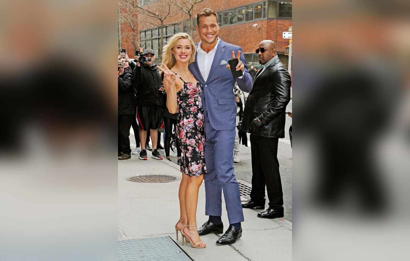 Bachelor Colton Underwood and Cassie Randolph share a kiss outside of the AOL Build