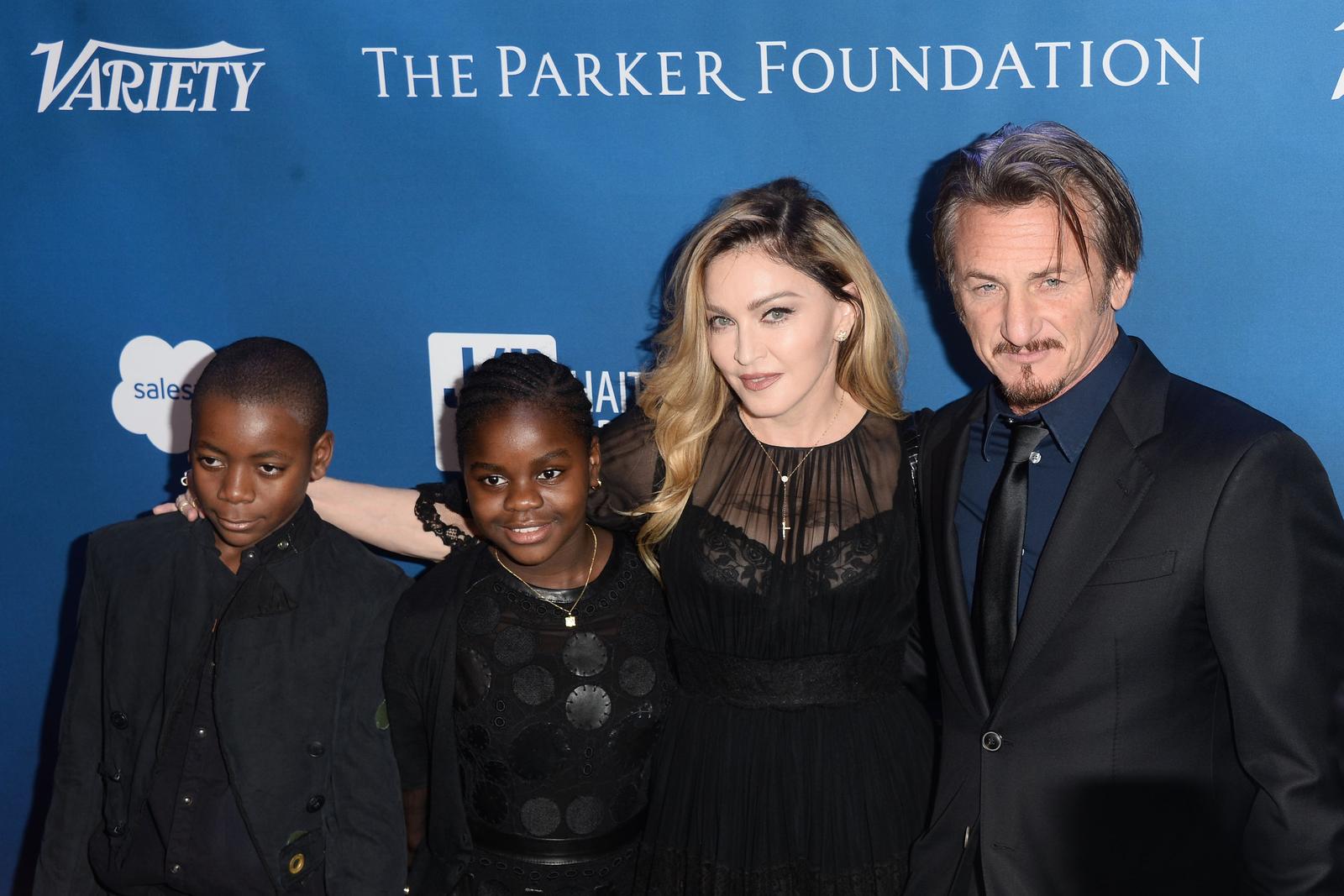 Still In Love! Madonna And Sean Penn Hold Hands At Haiti Charity Event