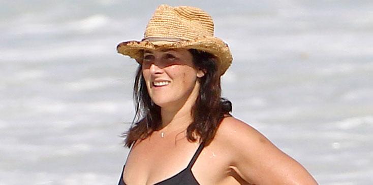 Ouch! Ricki Lake Struggles With Her Tight Bathing Suit While In