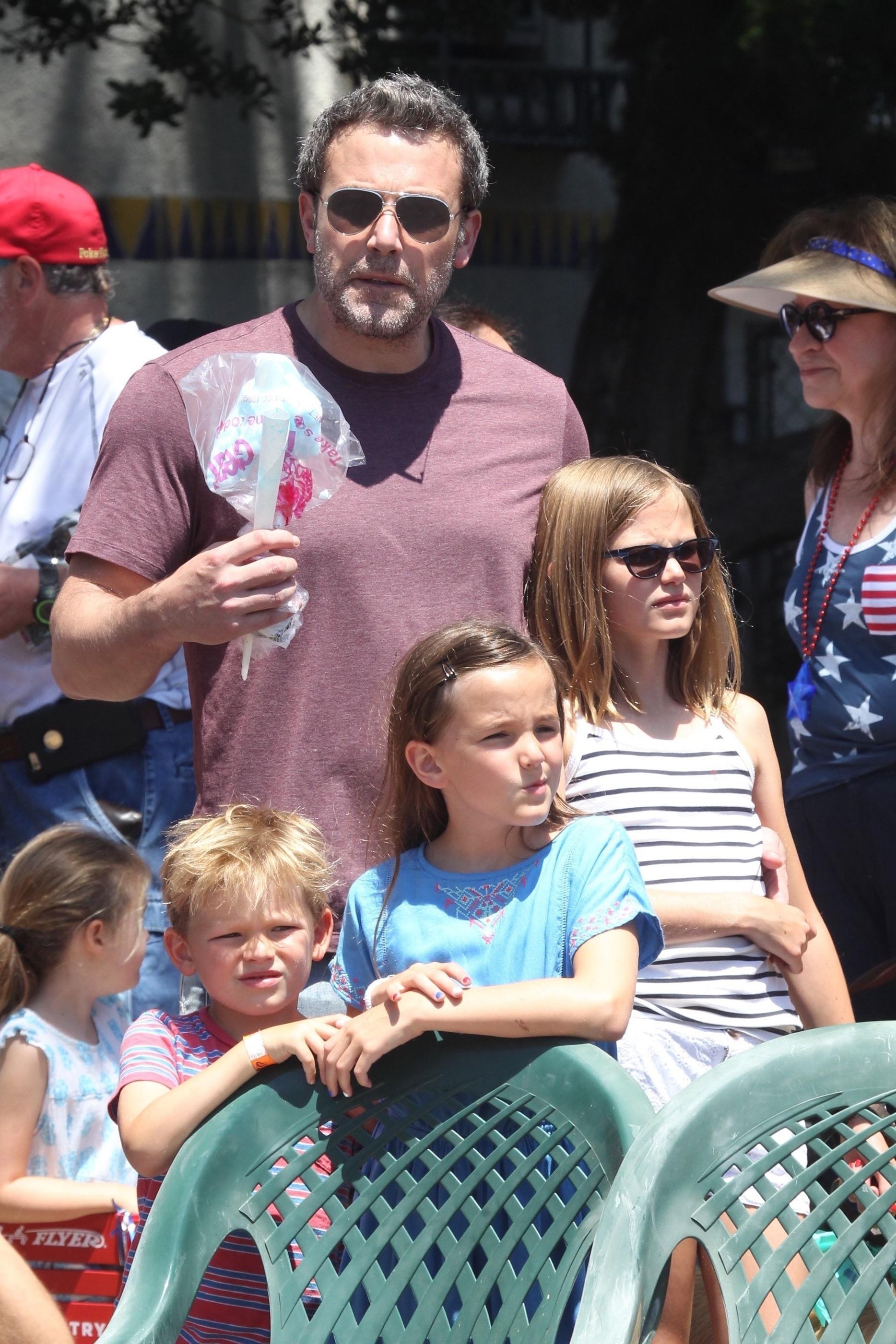 Ben Affleck and ex Jennifer Garner take their kids to the 4th of July parade