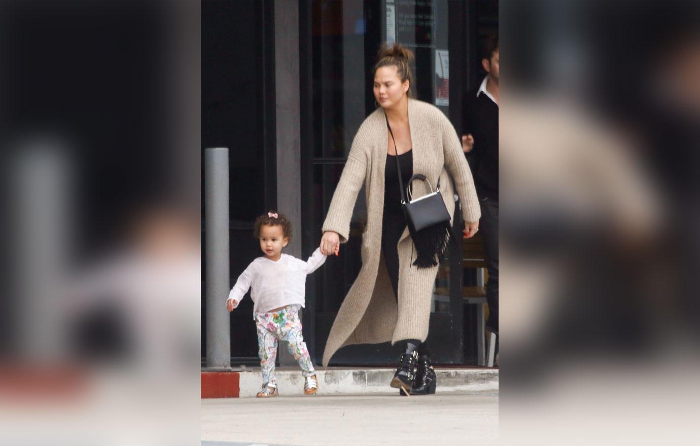 *EXCLUSIVE* Chrissy Teigen and John Legend shop at PC Greens with a cranky Luna