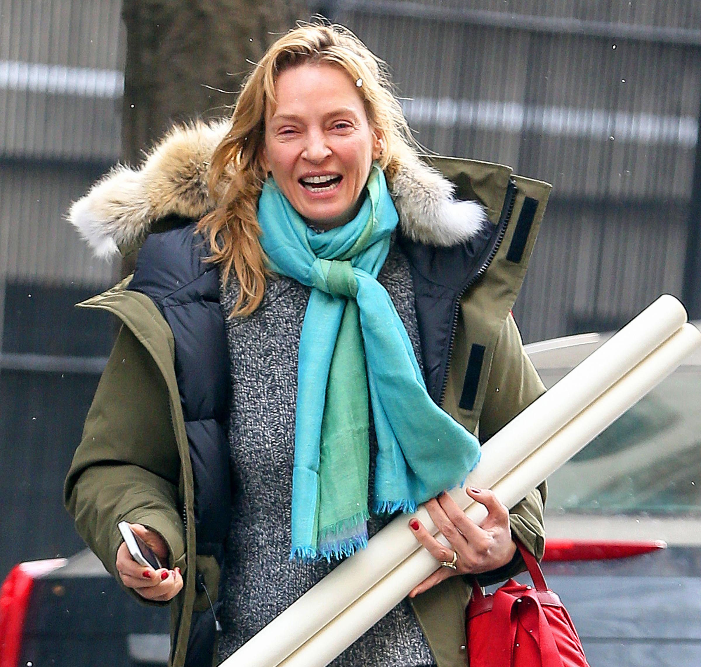 EXCLUSIVE: Uma Thurman showed off her multitasking skills as she ran errands in New York City