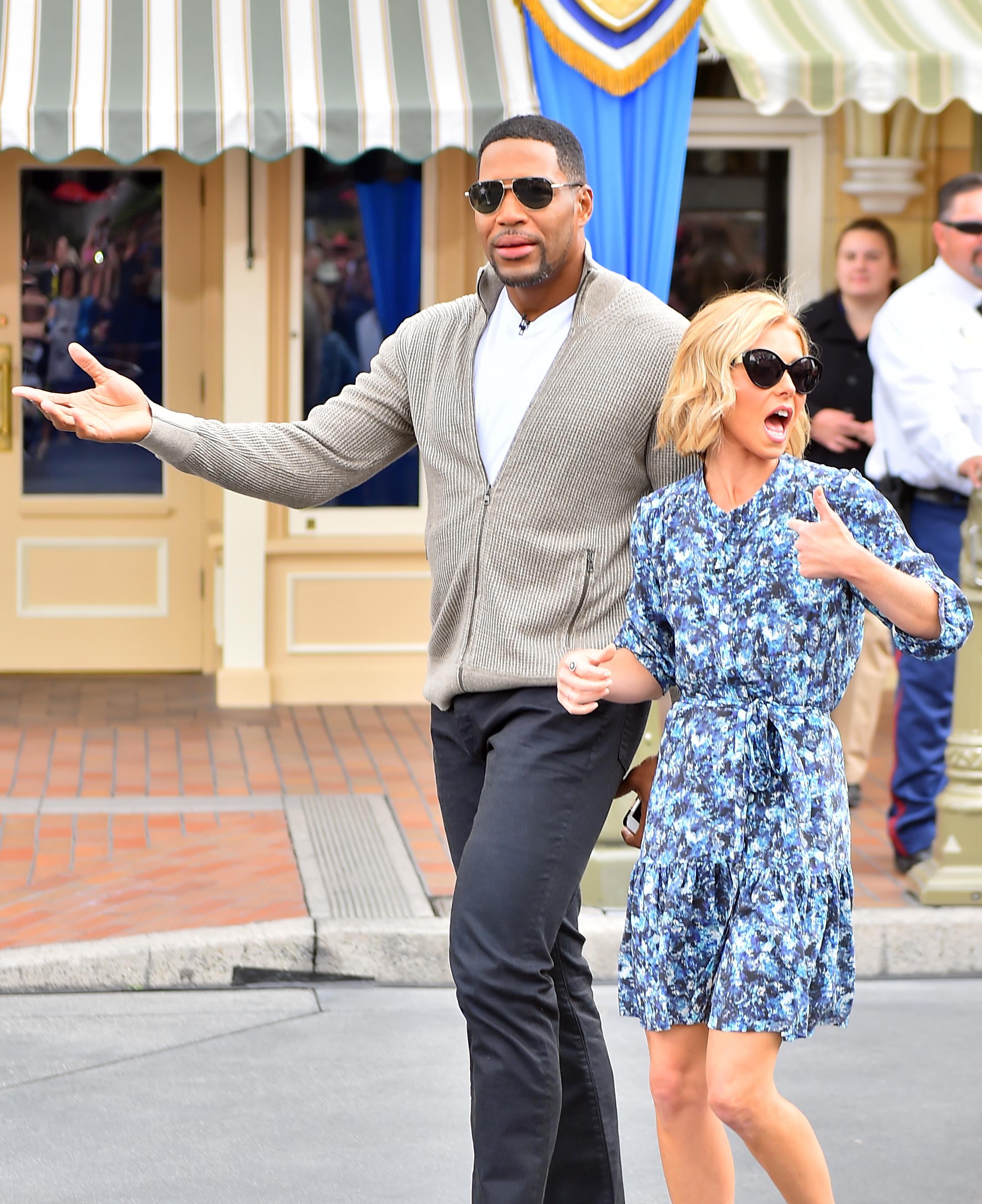 Kelly Ripa and Michael Strahan arrive to film their show at Disneyland