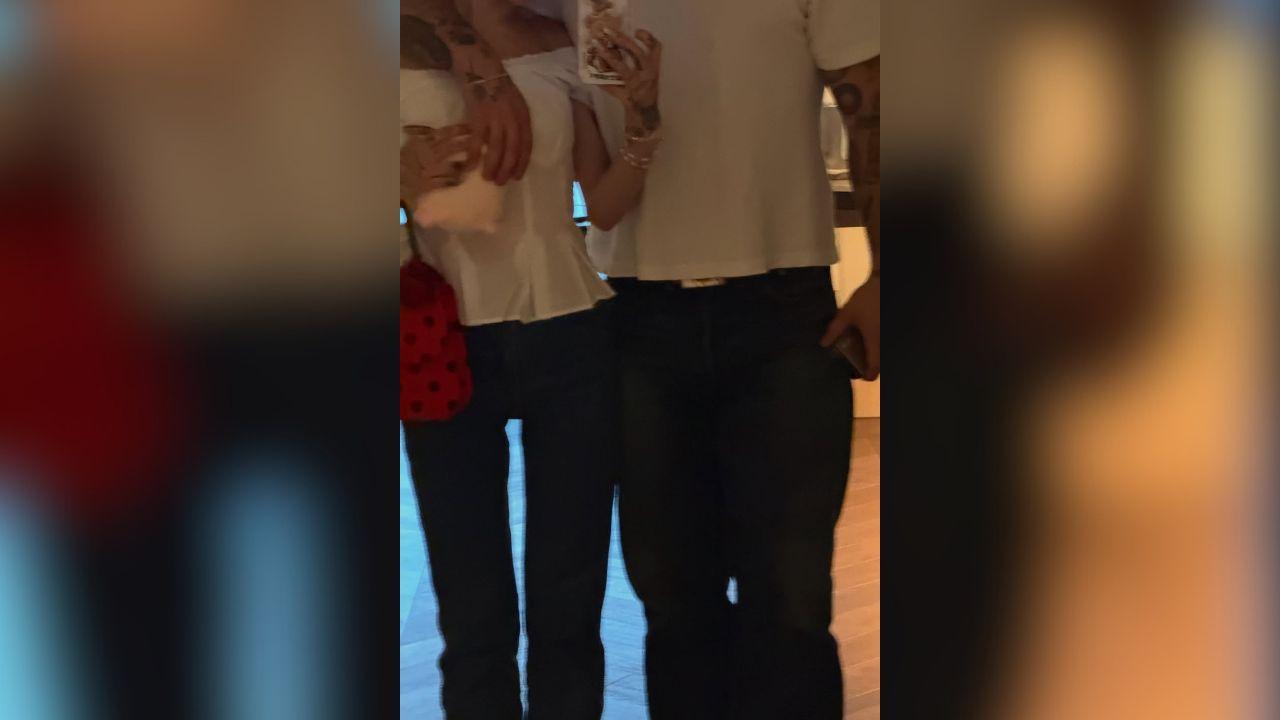 Image of Ariana Grande posted a picture of herself and Ricky Alvarez in matching outfits.
