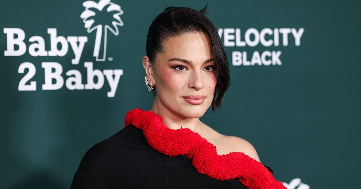 ashley graham spills out black dress  golden globes red carpet