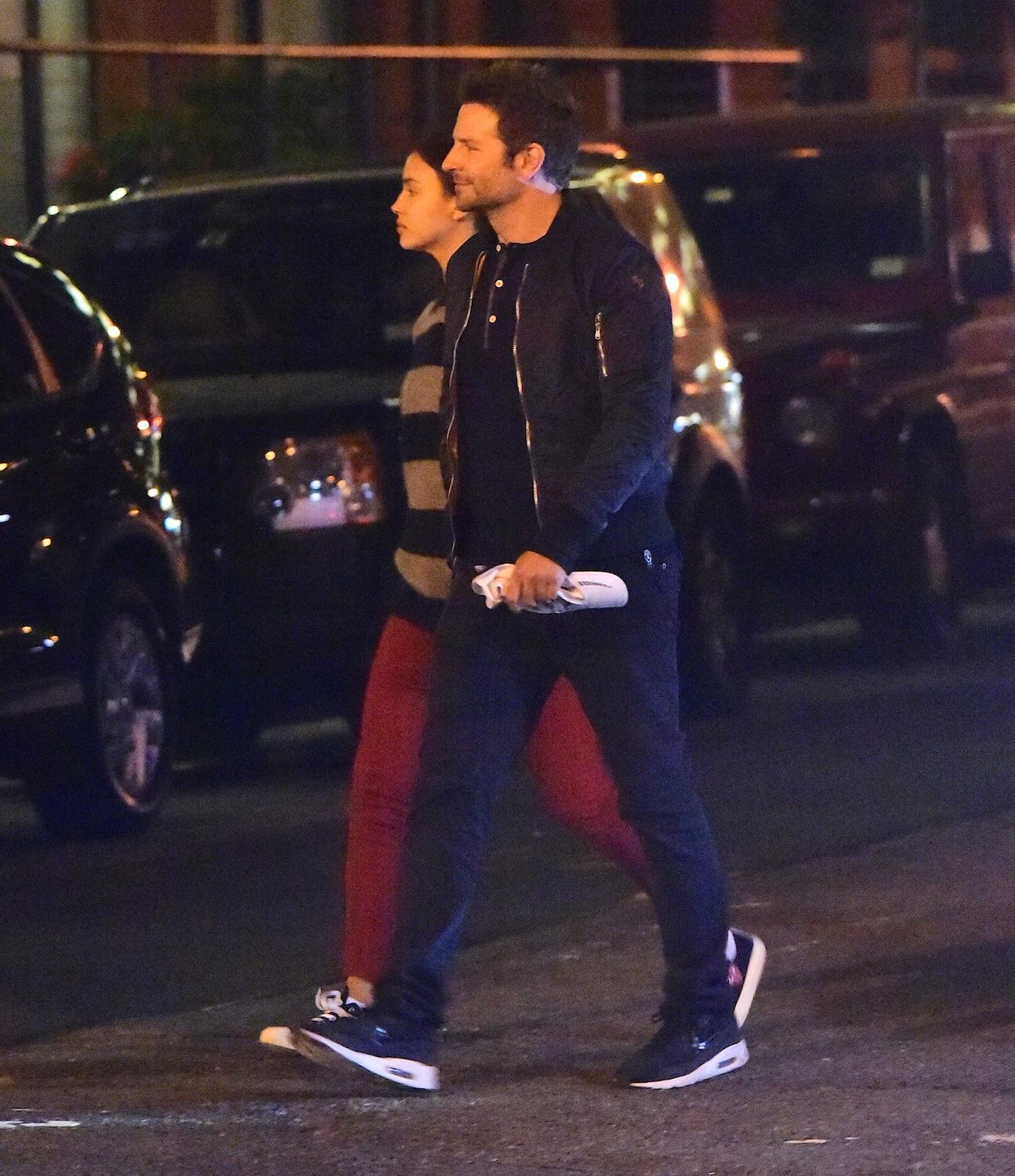 EXCLUSIVE: **PREMIUM EXCLUSIVE RATES APPLY &#8211; STRICTLY NO WEB UNTIL 11PMPST THURSDAY OCT 22ND 2015** Bradley Cooper and Irina Shayk Get Playful as they Kiss and Hold Hands on Late Night Stroll in NYC