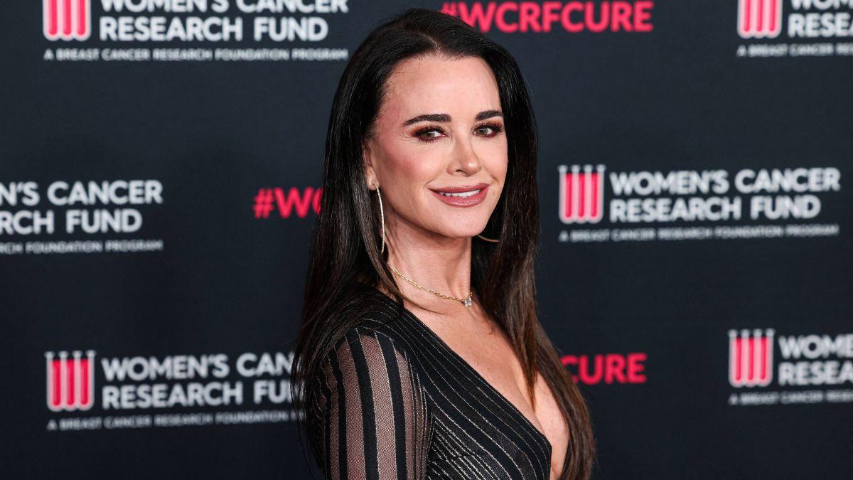 Image of Kyle Richards supported her daughter's chest lift.