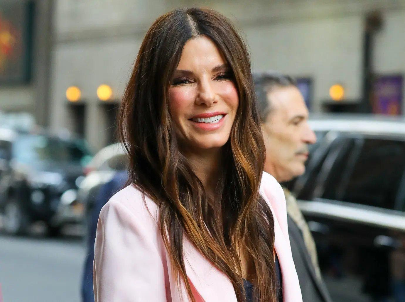 sandra bullock reunites speed costar keanu reeves first red carpet bryan randall death