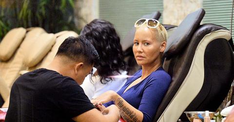 EXCLUSIVE: Amber Rose gets her nails done with a mystery man in Los Angeles, CA.