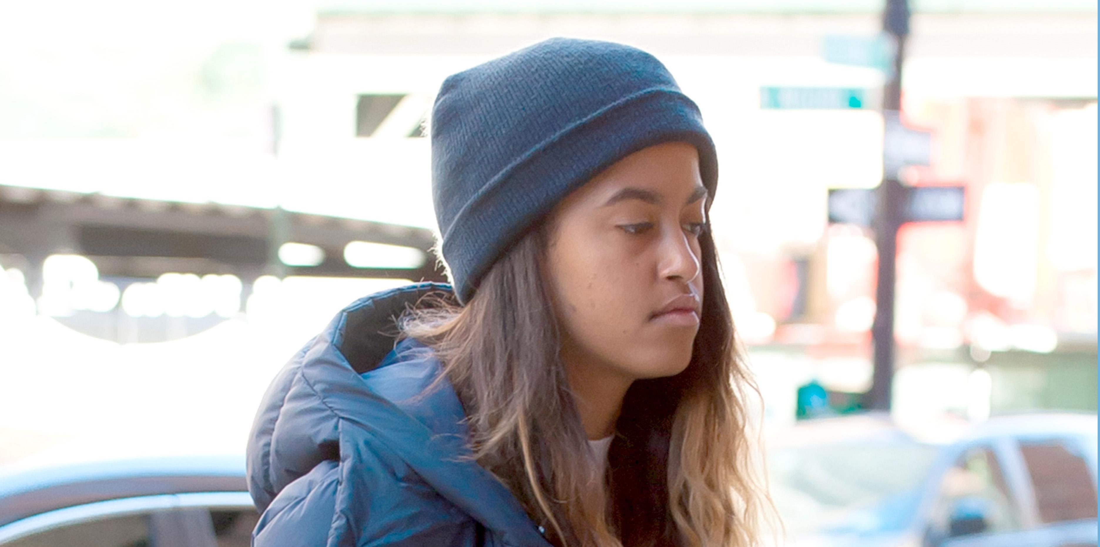 Malia Obama arrives to work in New York in a heavy blue coat