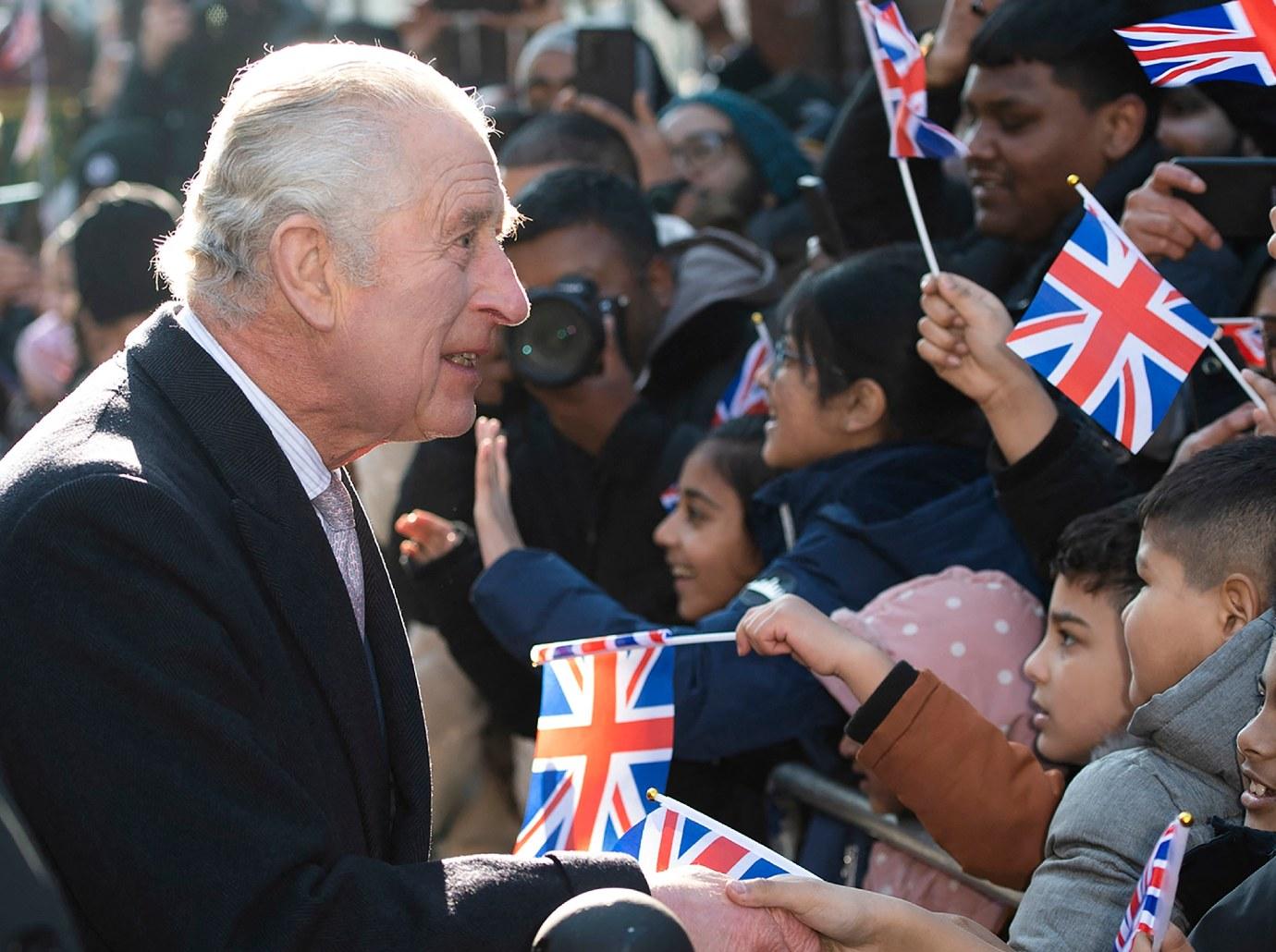 King Charles Greeted By Protestors Holding 'Not My King' Signs