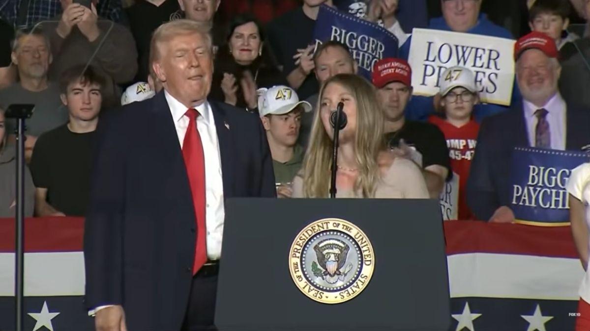 image of Donald Trump invited two women onto the stage unexpectedly.