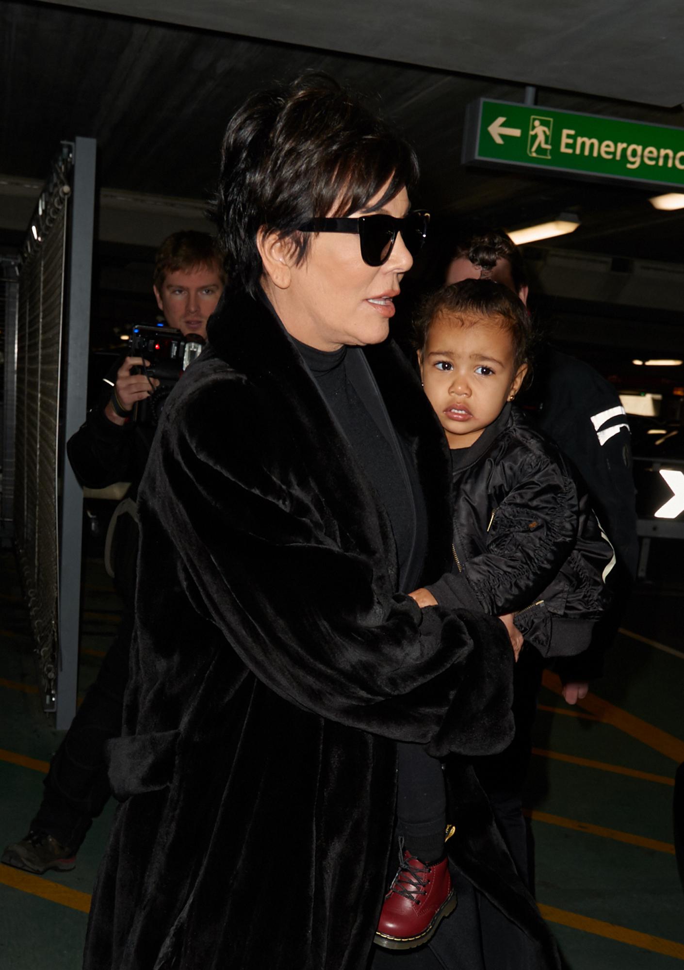 Kris Jenner and baby North West at Heathrow Airport