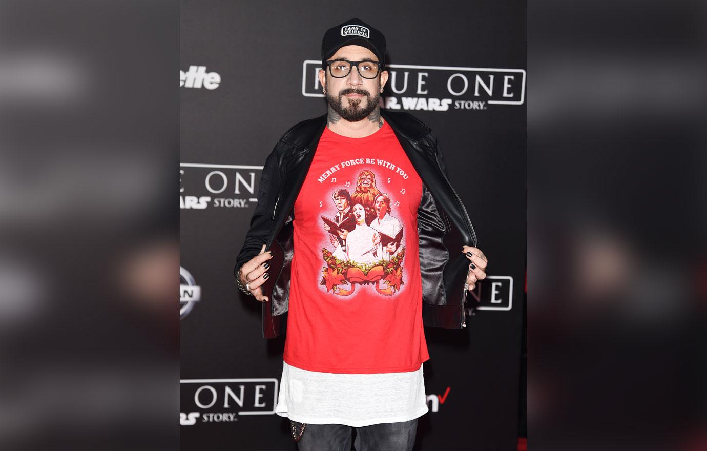 Aj mclean in red graphic shirt